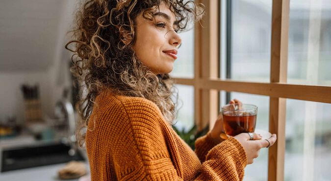 Mulher tomando café